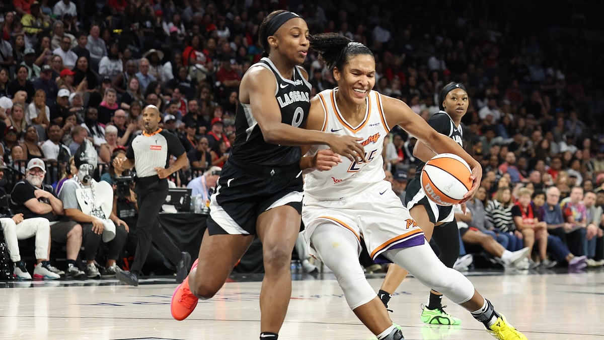Alyssa Thomas #25 of the Phoenix Mercury drives to the basket against Jackie Young #0 of the Las Vegas Aces in the fourth quarter of Game One of the 2025 WNBA Playoffs finals at Michelob ULTRA Arena on October 03, 2025 in Las Vegas, Nevada.