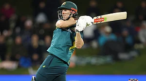 Mitchell Marsh hits a shot for Australia against New Zealand.