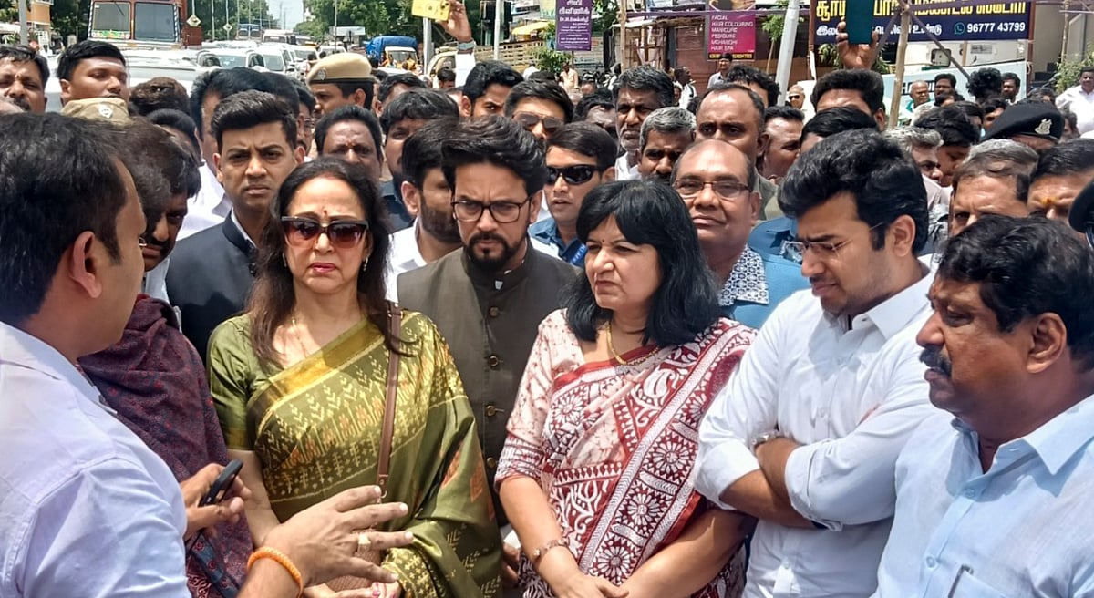 pti : Karur: A BJP delegation led by MP and actor Hema Malini interacts with officials during a visit to inspect the TVK rally stampede spot, in Karur district