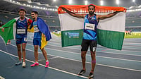 PTI : India's Sandeep, right, celebrates after finishing third in the men's 200m T44 final during the World Para Athletics Championships 2025 in New Delhi.