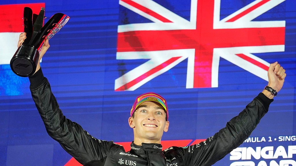 Photo: AP : Singapore Grand Prix F1 Highlights: Mercedes driver George Russell of Britain celebrates after winning the race.