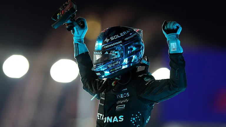 George Russell celebrates his win - null