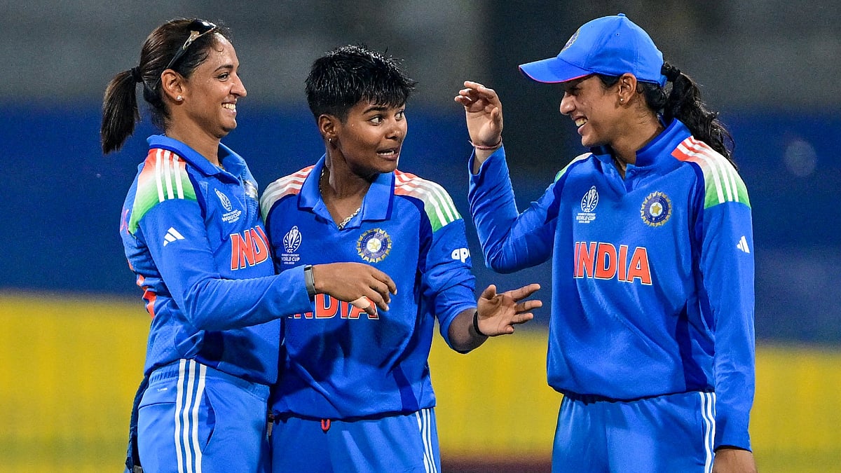 Kranti Goud, Harmanpreet Kaur, Smriti Mandhana in action for India against Pakistan in ICC Women's ODI World Cup 2025. - File Photo