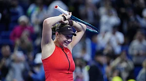 Amanda Anisimova celebrates her victory at the China Open on Sunday