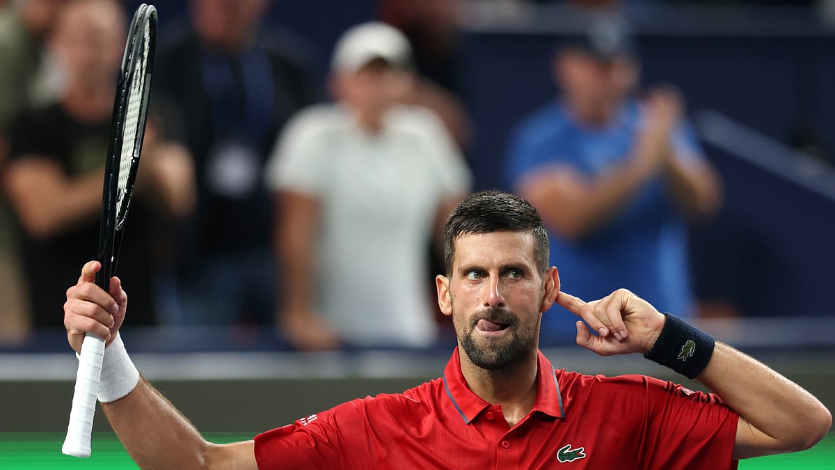 Novak Djokovic celebrates his win in Shanghai on Sunday