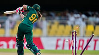  (AP Photo/Anupam Nath) : South Africa's Sune Luus bowled out by England's Lauren Bell during the ICC Women's Cricket World Cup match between England and South Africa at Barsapara Cricket Stadium in Guwahati, India, Friday, Oct. 3, 2025.