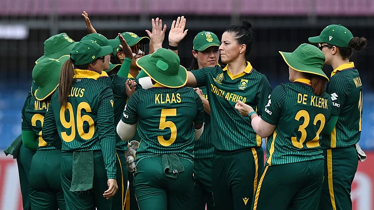 South Africa's Marizanne Kapp celebrates with teammates the wicket of New Zealand opener Suzie Bates during their ICC Women's World Cup match in Indore. - ICC