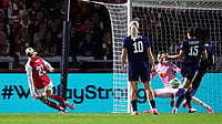 | Photo: AP/John Walton : Arsenal's Alessia Russo scores their side's first goal the Women's Champions League soccer match between Arsenal and OL Lyonnes at Meadow Park, Borehamwood, England, Tuesday, Oct, 7, 2025. 