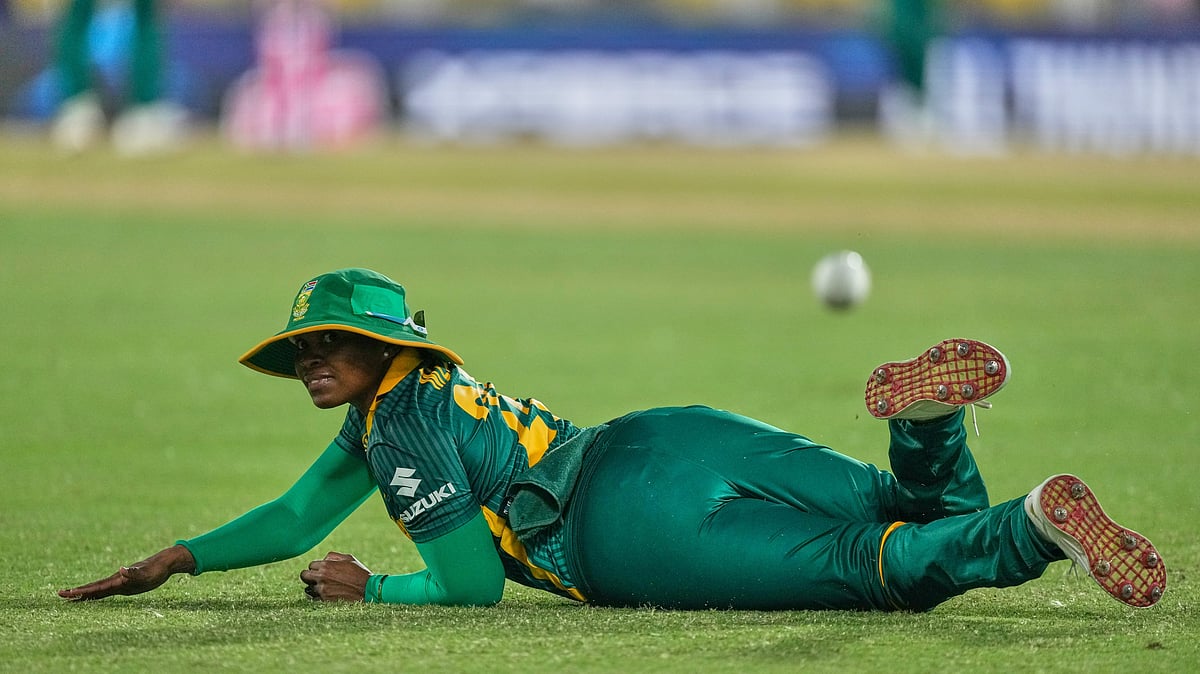 (AP Photo/Anupam Nath) : South Africa's Nonkululeko Mlaba fields a ball during the ICC Women's Cricket World Cup match between England and South Africa at Barsapara Cricket Stadium in Guwahati, India, Friday, Oct. 3, 2025.