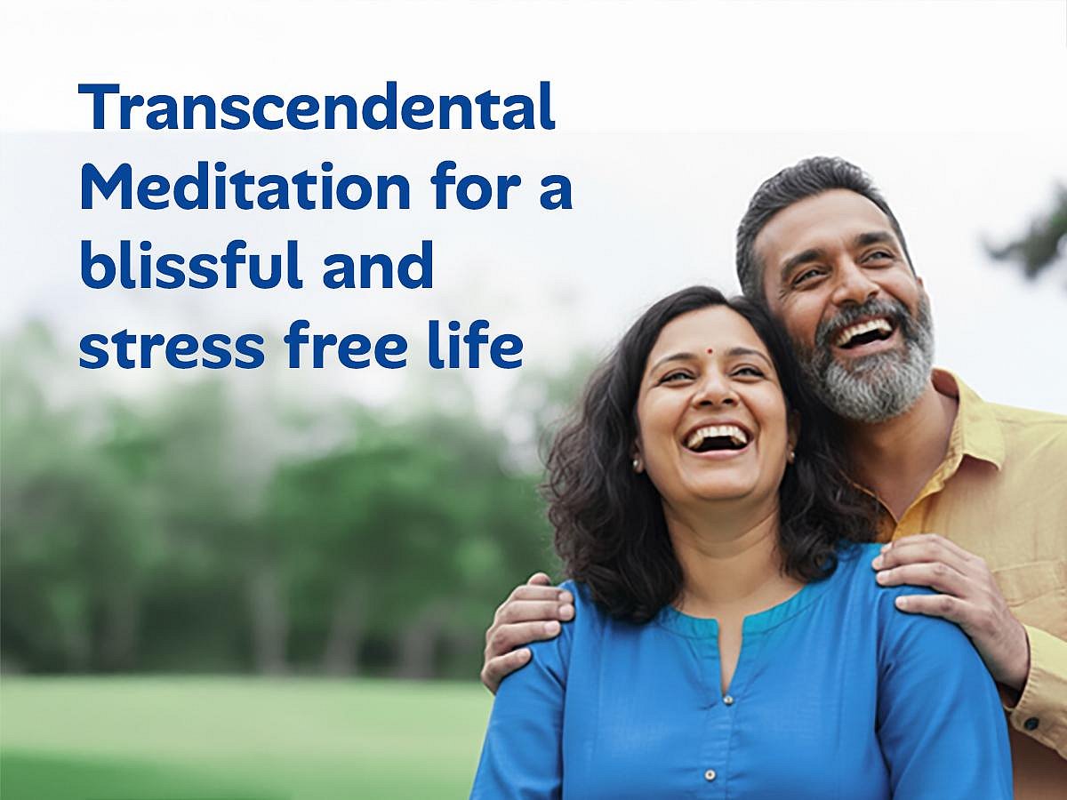 Two laughing people and the text: Transcendental Meditation for a blissful and stress free life.