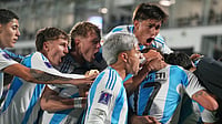 | Photo: AP/Andre Penner : Argentina's Dylan Gorosito, right, is congratulated after scoring his side's first goal against Italy during a FIFA U-20 World Cup Group D soccer match at Elias Figuero Brander in Valparaiso, Chile, Saturday, Oct. 4, 2025. 