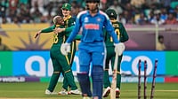 | Photo: AP/Aijaz Rahi : South Africa's Nonkululeko Mlaba, left, celebrates with teammates after the dismissal of India's Harleen Deol, front, during the ICC Women's Cricket World Cup match between India and South Africa at ACA-VDCA Cricket Stadium in Visakhapatnam, India, Thursday, Oct. 9, 2025. 