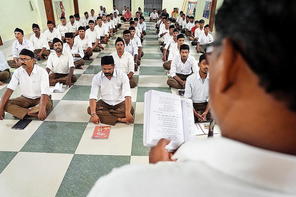 RSS members at a ‘sayam shakha’ during their training camp