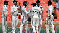 | Photo: AP/Ajit Solanki : India Vs West Indies, 1st Test: IND players celebrate a wicket.