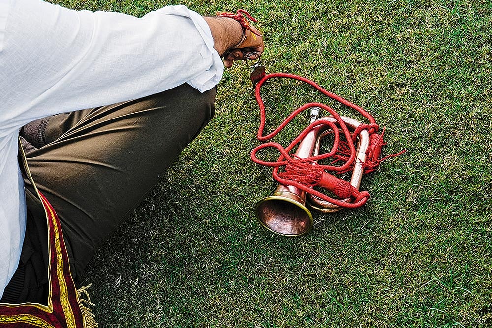 A trumpet lies beside an RSS member