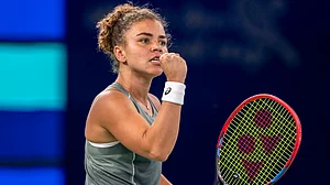 Jasmine Paolini celebrates her victory over Iga Swiatek