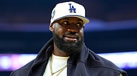 Lebron James #23 of the Los Angeles Lakers looks on against the Golden State Warriors during a time out in the first half of a preseason NBA game at Chase Center on October 05, 2025 in San Francisco, California.
