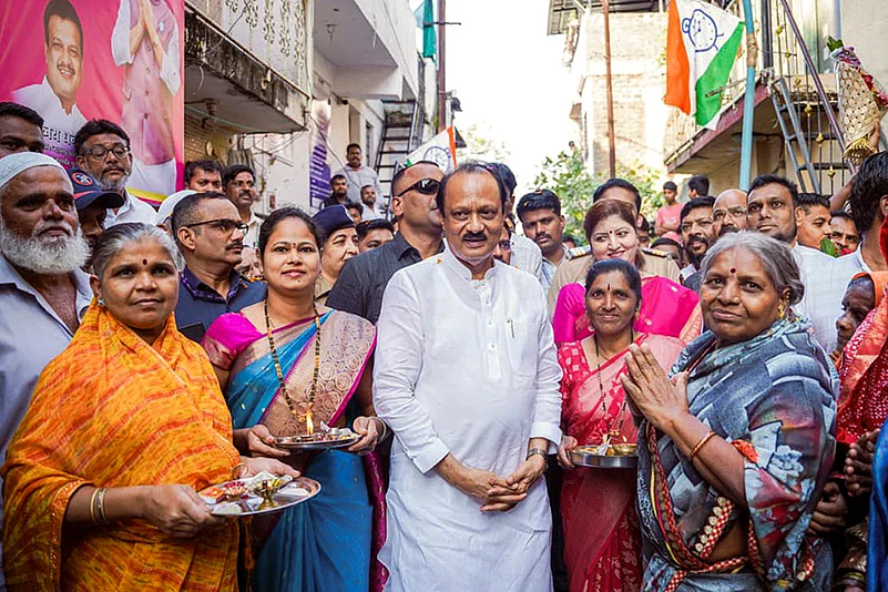 Ajit Pawar meets NCP workers during Rashtravadi Parivar Milan in Pune