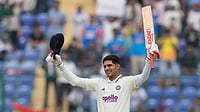 (AP Photo/Manish Swarup) : India's captain Shubman Gill celebrates after scoring a century on the second day of the second cricket test match between India and West Indies at the Arun Jaitley Stadium in New Delhi, India, Saturday, Oct.11, 2025.
