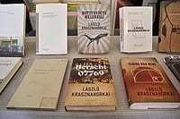 Henrik Montgomery/TT via AP : Books by Hungarian author László Krasznahorkai at Börshuset in Stockholm, after he was announced as the recipient of the Nobel Prize in Literature at the Nobel Assembly of the Karolinska Institutet, in Stockholm, Sweden, Thursday, Oct. 9, 2025. 