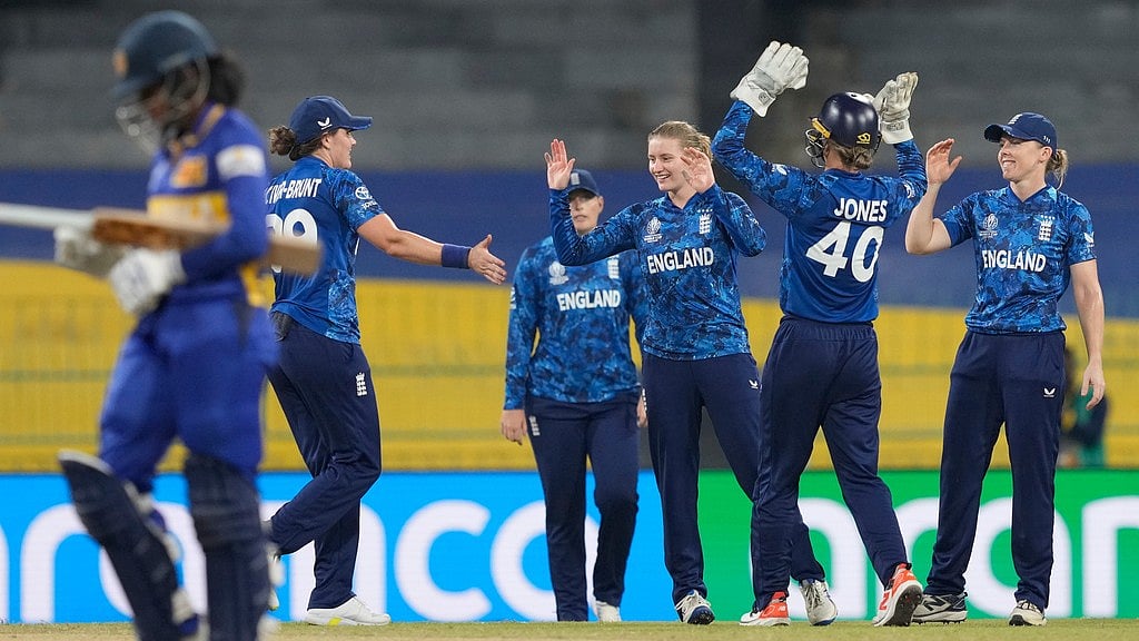 Photo: AP : Sri Lanka Vs England Live Cricket Score, Women's ODI World Cup: Charlie Dean celebrates the wicket of Vishmi Gunarathne in Colombo.