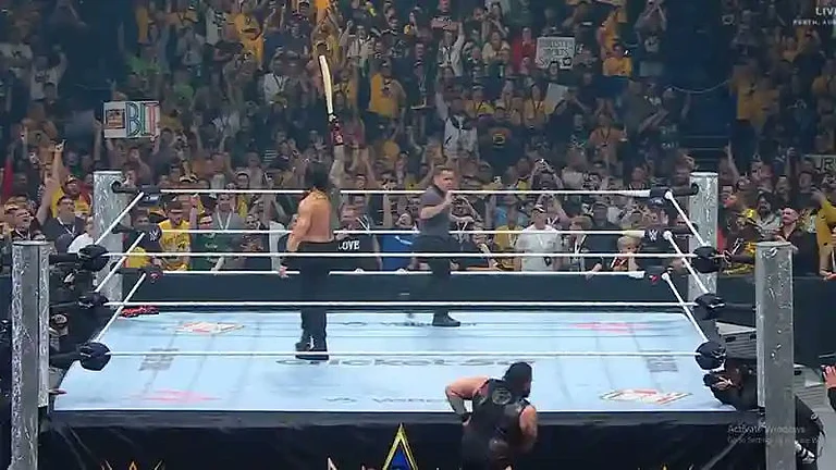 Roman Reigns with a cricket bat at a WWE event in Perth, Australia - WWE