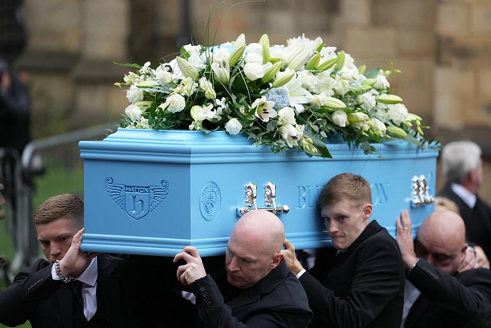 | Photo: AP/Jon Super : Britain Boxing Hatton Funeral
