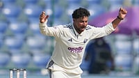 (AP Photo/Manish Swarup) : India's Kuldeep Yadav celebrates the dismissal of West Indies' Shai Hope on the third day of the second cricket test match between India and West Indies at the Arun Jaitley Stadium in New Delhi, India, Sunday, Oct.12, 2025.