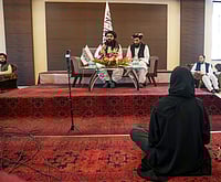 PTI :  Afghanistan Foreign Minister Amir Khan Muttaqi, left, addresses a press conference, in New Delhi, Sunday, Oct. 12, 2025.