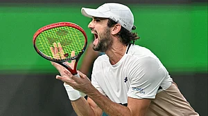 Valentin Vacherot celebrates his win in Shanghai Masters 2025 against Arthur Rinderknech.