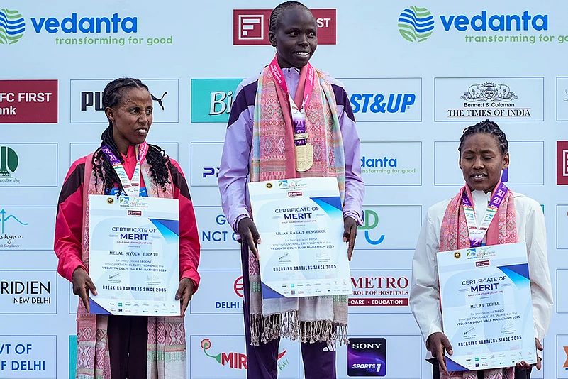 Delhi Half Marathon 2025 photos_Lilian Kasait Rengeruk, Melal Siyoum Biratu, Mulat Tekle