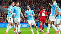 | Photo: AP/David Davies : Belgium's Kevin De Bruyne, second left, celebrates scoring their side's first goal of the game from a penalty during the World Cup European Qualifying soccer match between Wales and Belgium at the Cardiff City Stadium in Cardiff, Monday, Oct. 13, 2025.