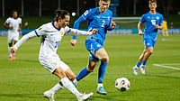 | Photo: AP/Brynjar Gunnarsson : France's Florian Thauvin crosses the ball past Iceland's Logi Tomasson during a World Cup 2026 group D qualifying soccer match between Iceland and France in Reykjavik, Monday, Oct. 13, 2025.