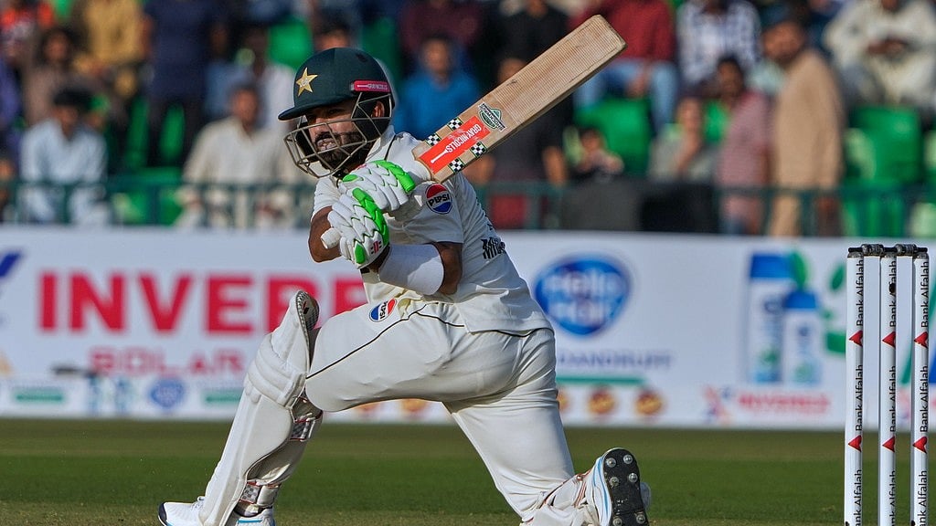 AP : Pakistan's Mohammad Rizwan bas during the first day of the first Test against South Africa in Lahore.