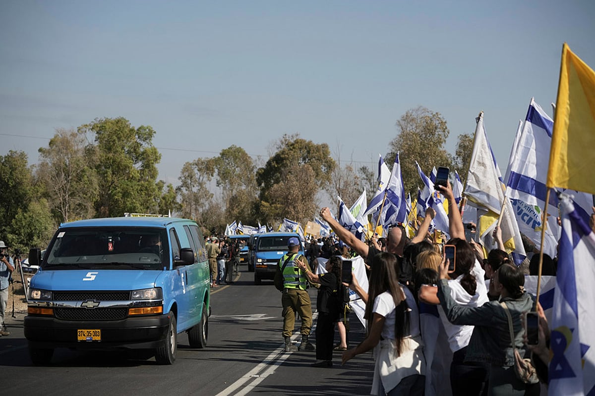 Israel Hamas Gaza war- Hostage release _convoy carrying the israeli hostages