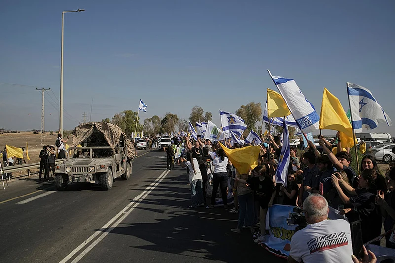 Israel Hamas Gaza war- Hostage release _convoy carrying the hostages