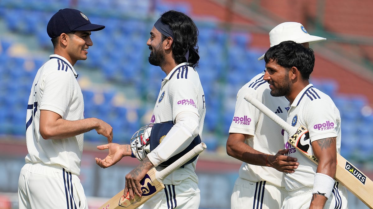 (AP Photo/Manish Swarup) : India's captain Shubman Gill congratulates teammate KL Rahul and wicketkeeper Dhruv Jurel on wining the second cricket test match between India and West Indies at the Arun Jaitley Stadium in New Delhi, India, Tuesday, Oct.14, 2025. 