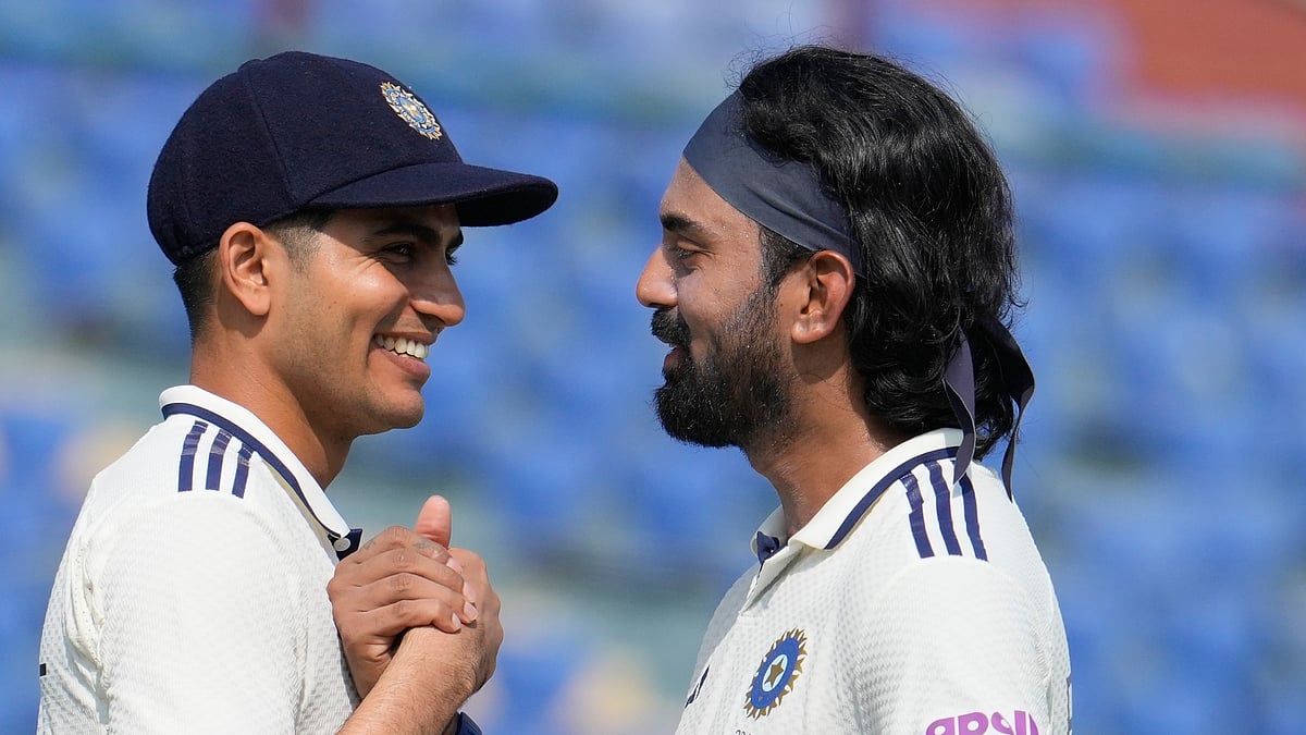 (AP Photo/Manish Swarup) : India's captain Shubman Gill congratulates teammate KL Rahul on wining the second cricket test match between India and West Indies at the Arun Jaitley Stadium in New Delhi, India, Tuesday, Oct.14, 2025.