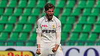 (AP Photo/K.M. Chaudary) : Pakistan's Shaheen Shah Afridi celebrates after taking the wicket of South Africa's Kyle Verreynne during the fourth day of the first test cricket match between Pakistan and South Africa, in Lahore, Pakistan, Wednesday, Oct. 15, 2025.