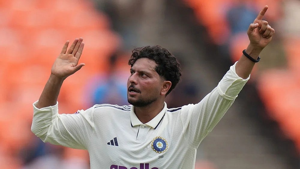 | Photo: AP/Ajit Solanki : West Indies vs India, 1st Test: Kuldeep Yadav in action.