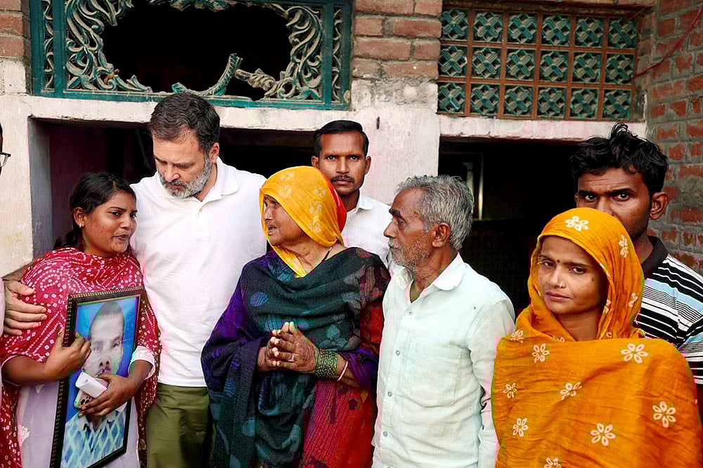 | Photo: Handout via PTI : Rahul Gandhi meets family of Dalit man allegedly lynched in Rae Bareli