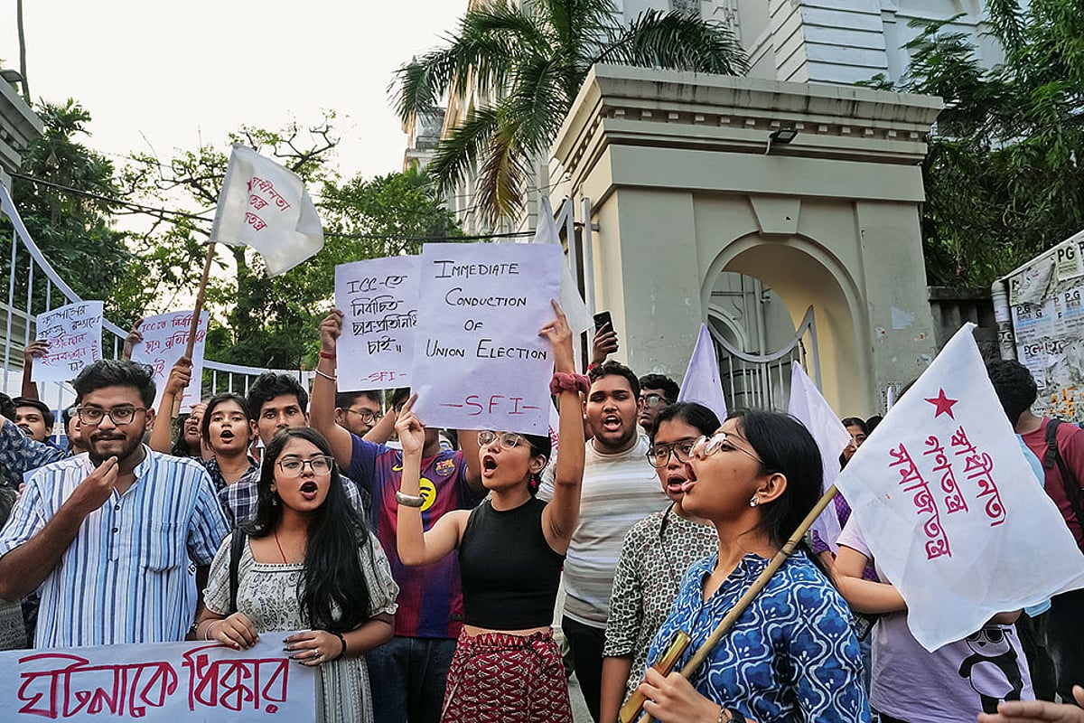 Students protest in front of the main gate of the Presidency University in Kolkata.