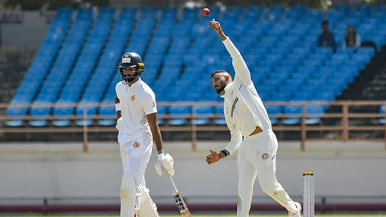 Ranji Trophy 2025-26: Dharmendrasinh Jadeja in action as Saurashtra take on Karnataka. - | Photo: PTI
