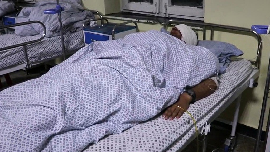 AP : Cricketer Mira Jan lies wounded in a hospital bed after a Pakistani cross-border airstrike that killed several people, including three other local cricketers, at the regional hospital in Afghanistan's eastern Paktika province.