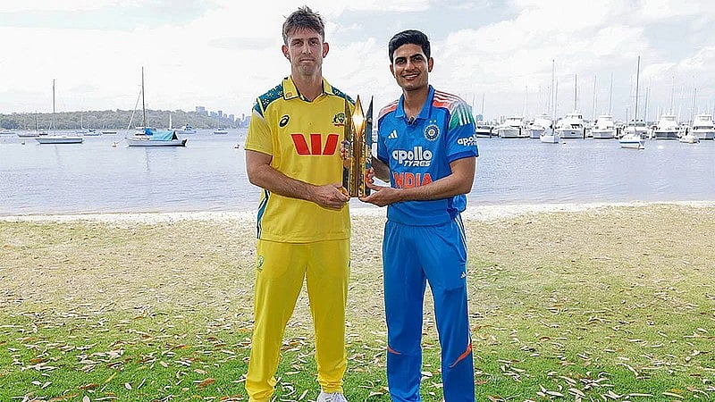 X/BCCI : Captains Shubman Gill, Mitchell Marsh pose with the trophy ahead of the first India vs Australia ODI in Perth.