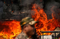 Day In Pics: October 18, 2025 | Photo: PTI/Karma Bhutia : Fire at Delhi's Brahmaputra Apartments