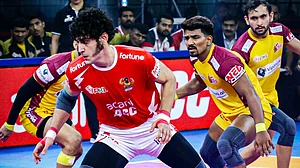 X/ProKabaddi : PKL 2025: Telugu Titans in action against Gujarat Giants.