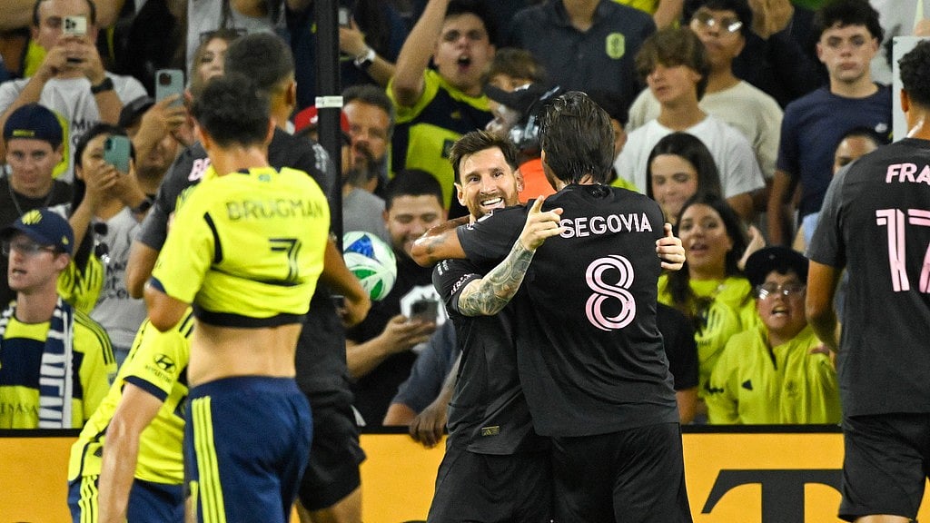 AP : Inter Miami forward Lionel Messi celebrates with midfielder Telasco Segovia (8) after scoring against Nashville SC during the MLS match.