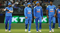| Photo: AAPImage/David Woodley via AP : Indian players make their way to the drinks station during the one day international cricket match between Australia and India in Perth Australia, Sunday, Oct. 19, 2025. 