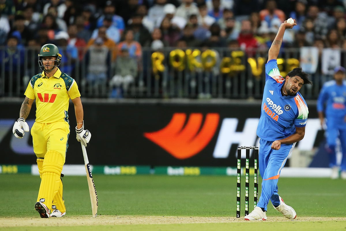 (David Woodley/AAPImage via AP) : India's Harshit Rana bowls during the one day international cricket match between Australia and India in Perth Australia, Sunday, Oct. 19, 2025. 